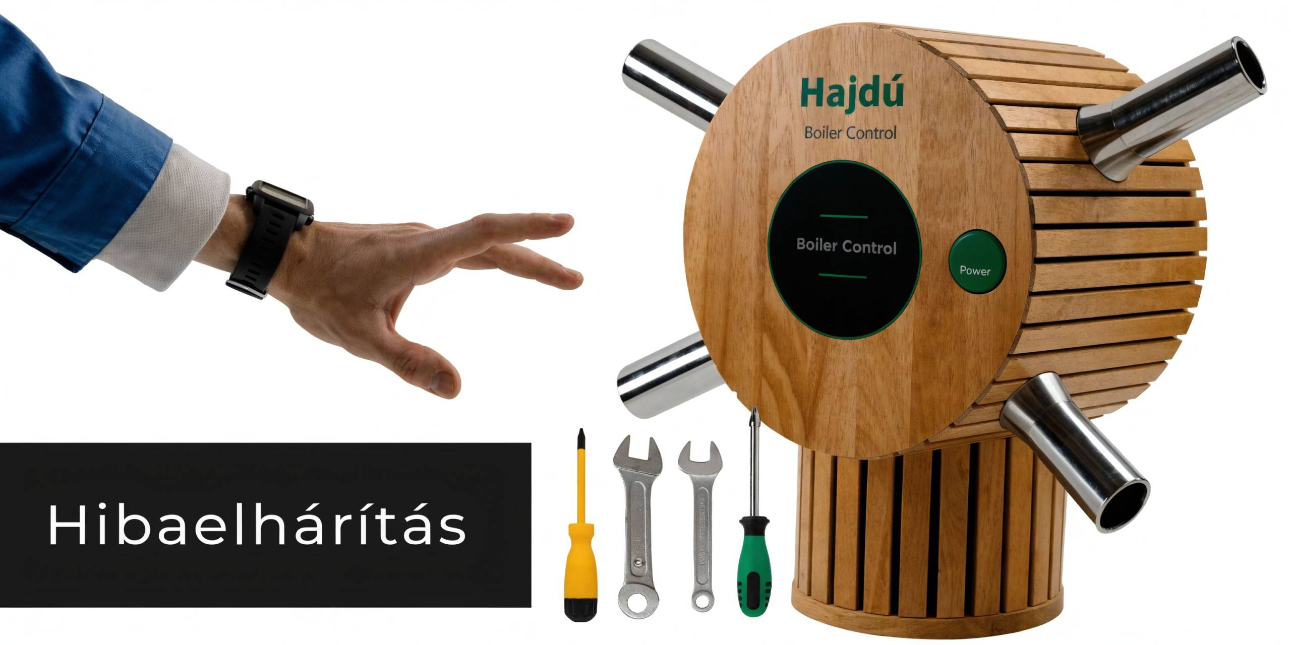 Szerelő keze nyúl a Hajdú márkájú, fémcsövekkel ellátott fa burkolatú kazánvezérlőhöz, mellette különböző szerelőszerszámok láthatóak.